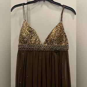 Beautiful goddess dress in gold and brown. Worn once.